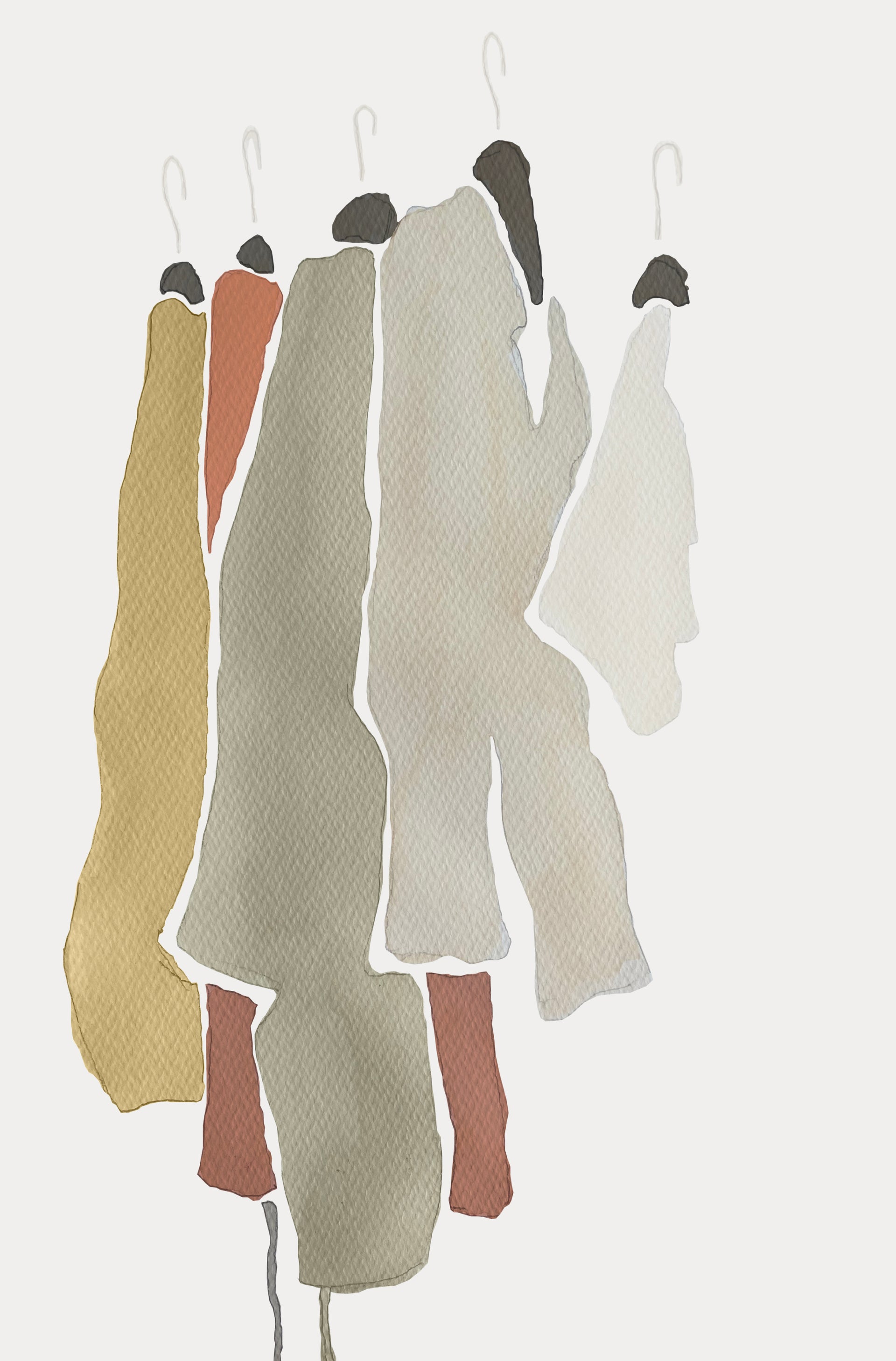 Set of colorful knitted garments hanging on a rack against a white background
