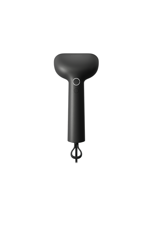 Black handheld steamer on a white background
