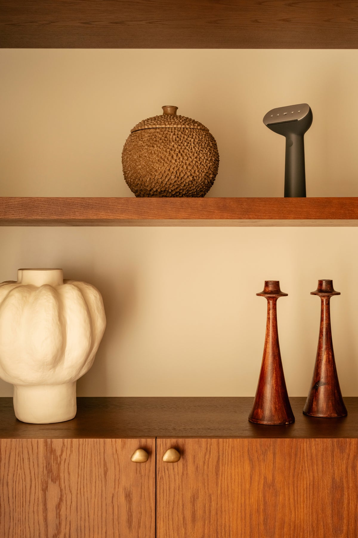 Black steamer on a shelf