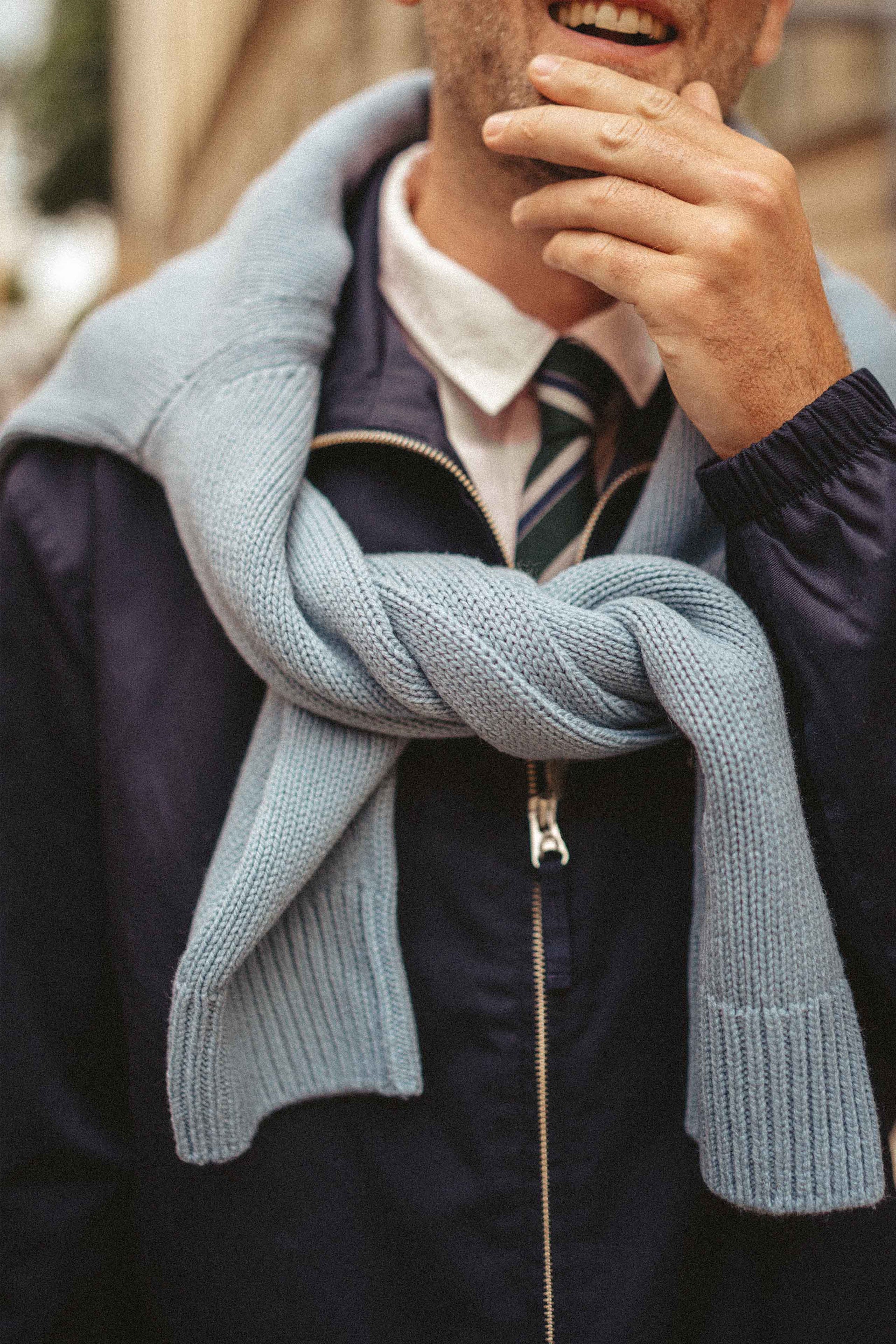 close up of guy wearing knit