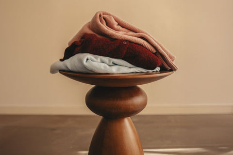 Knits stacked on table