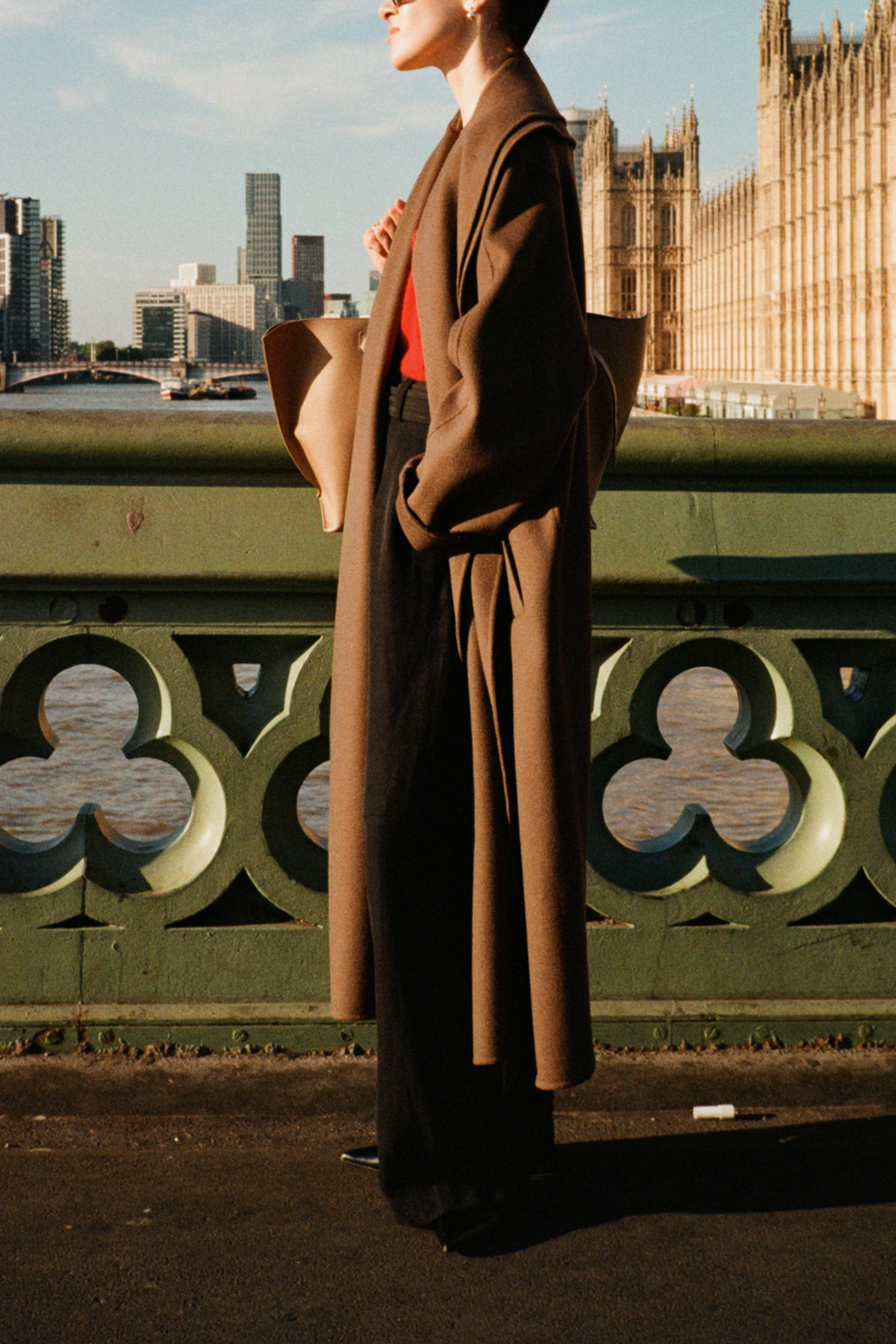 woman wearing a coat on the street