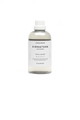 Bottle of Sandalwood Signature laundry detergent on a white background