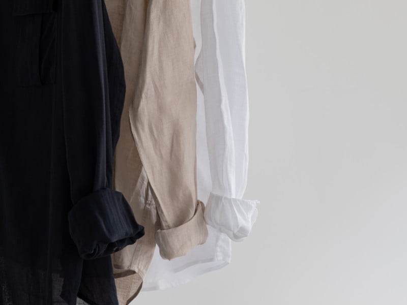 Black, beige, and white linen button-up shirts