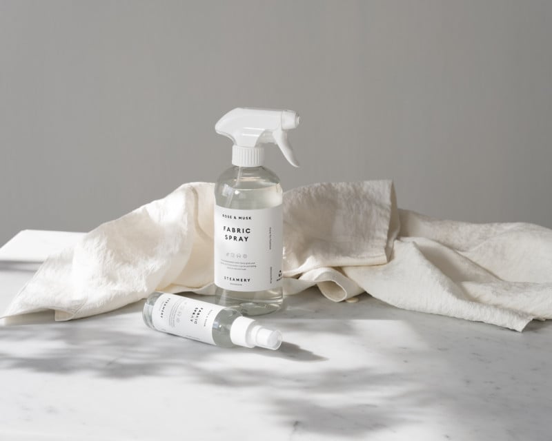 Fabric Spray in 500 ml and 100 ml in front of a white garment