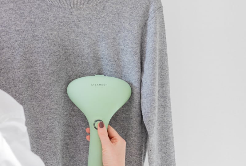 Steaming a sweater with Cirrus 2 Handheld Steamer