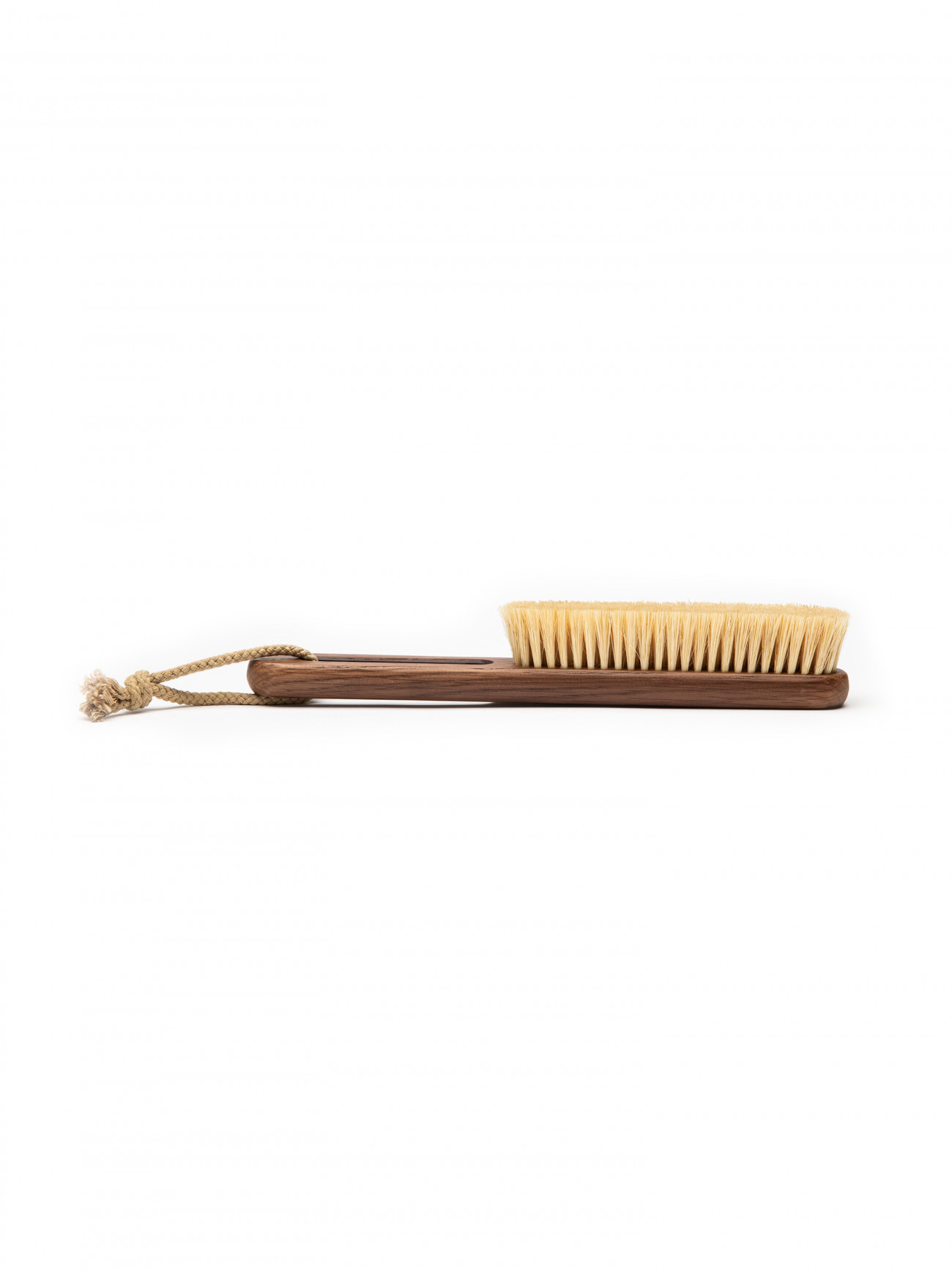 Steamery Clothing Brush. Side view.
